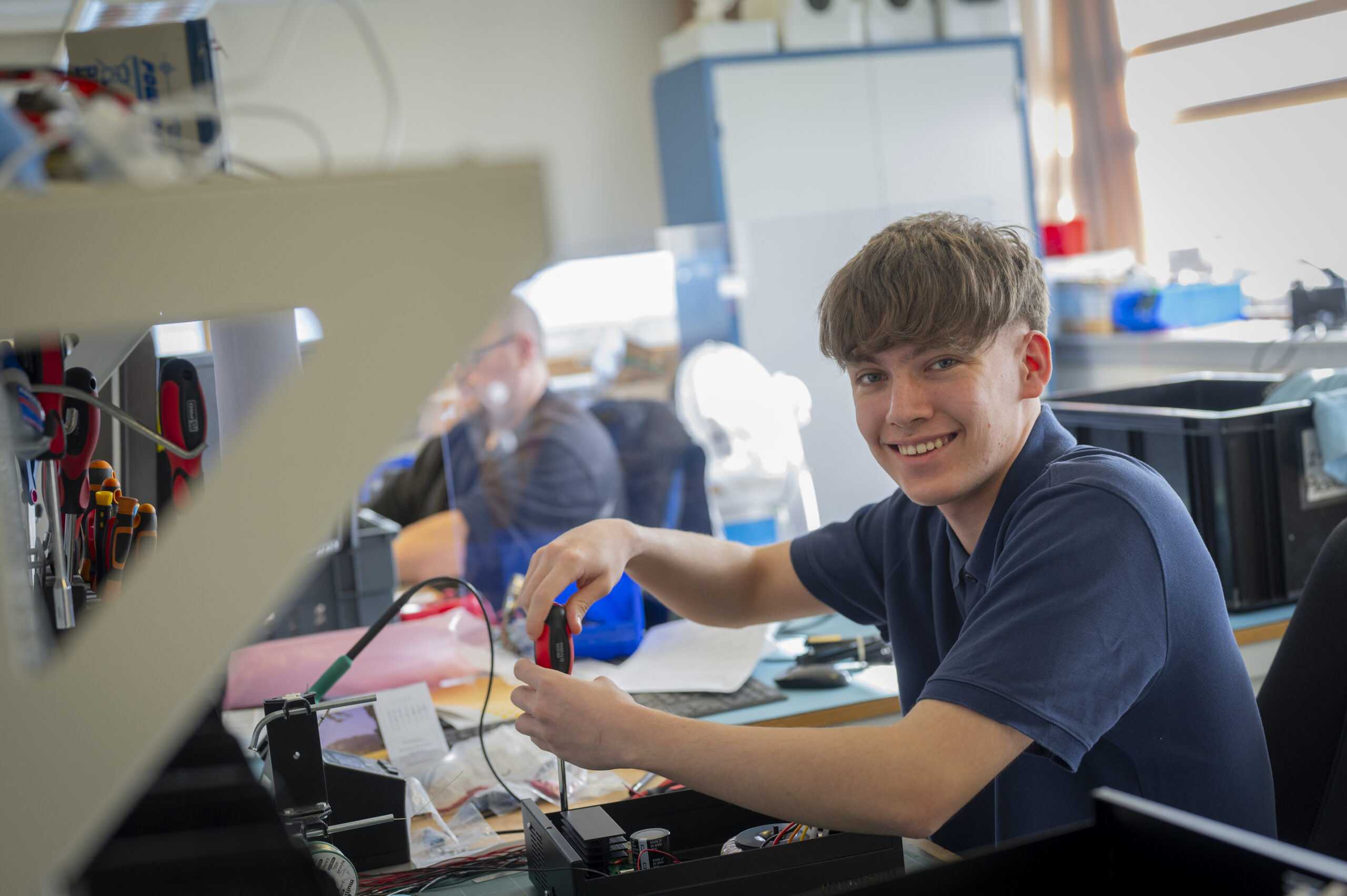 Pinpoint staff smiling